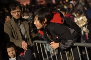 chinese_boy_on_fence